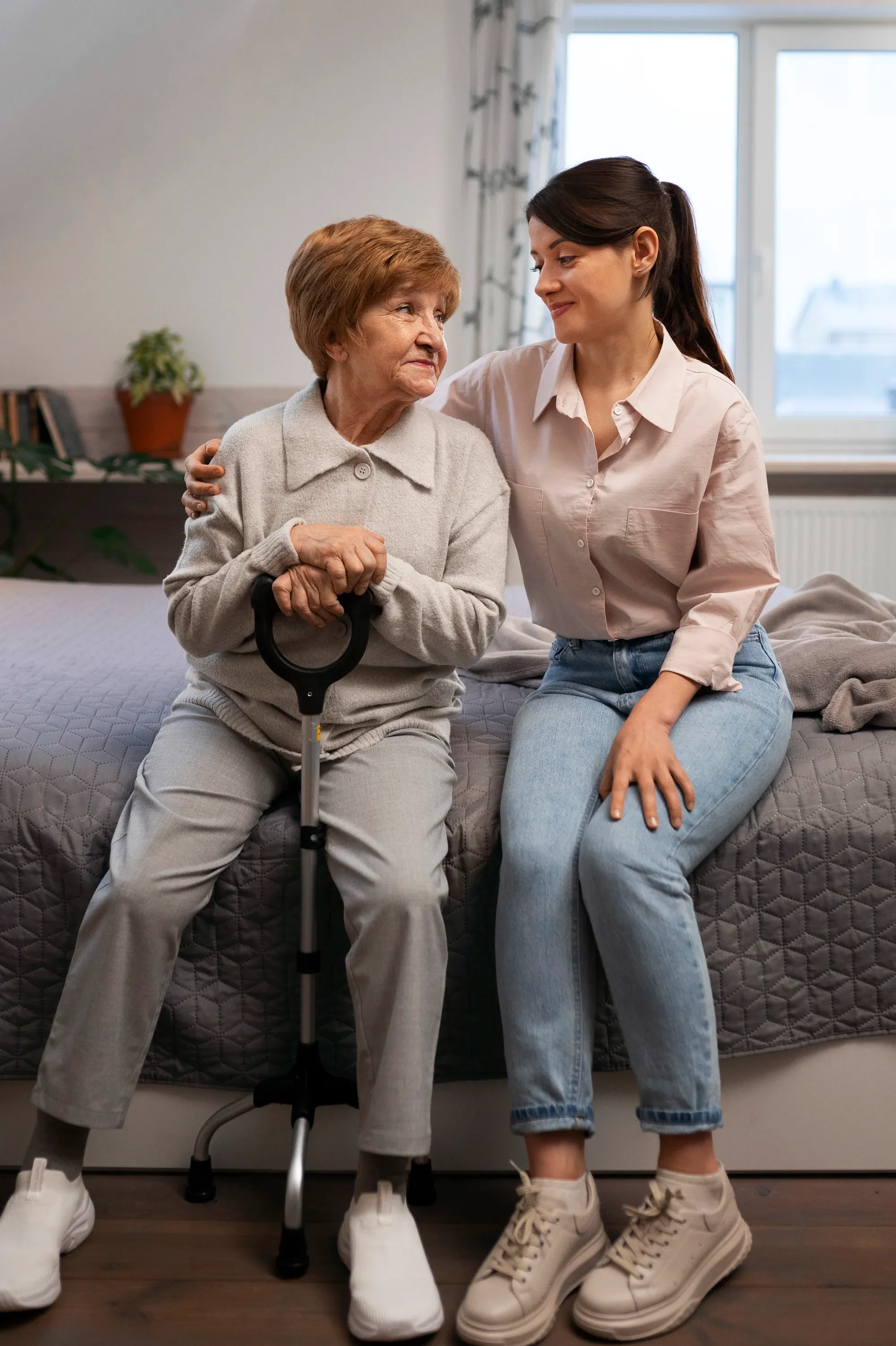 Caring support worker with client